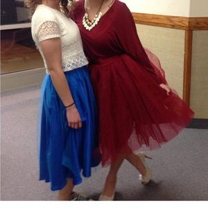 Red mid length tulle skirt. Perfect for the holidays or fancy night out!